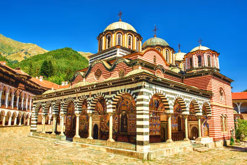 Hrelyo's Tower standing tall in the Rila Monastery courtyard